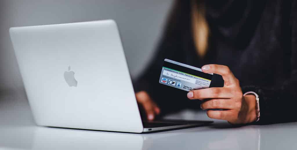 A professional woman looking online for a commercial loan for her business
